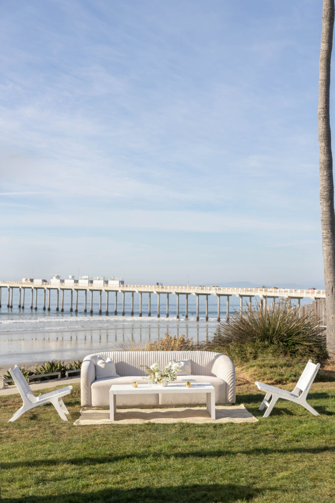 Lounge setup by Adore Folklore with coastal-modern furniture